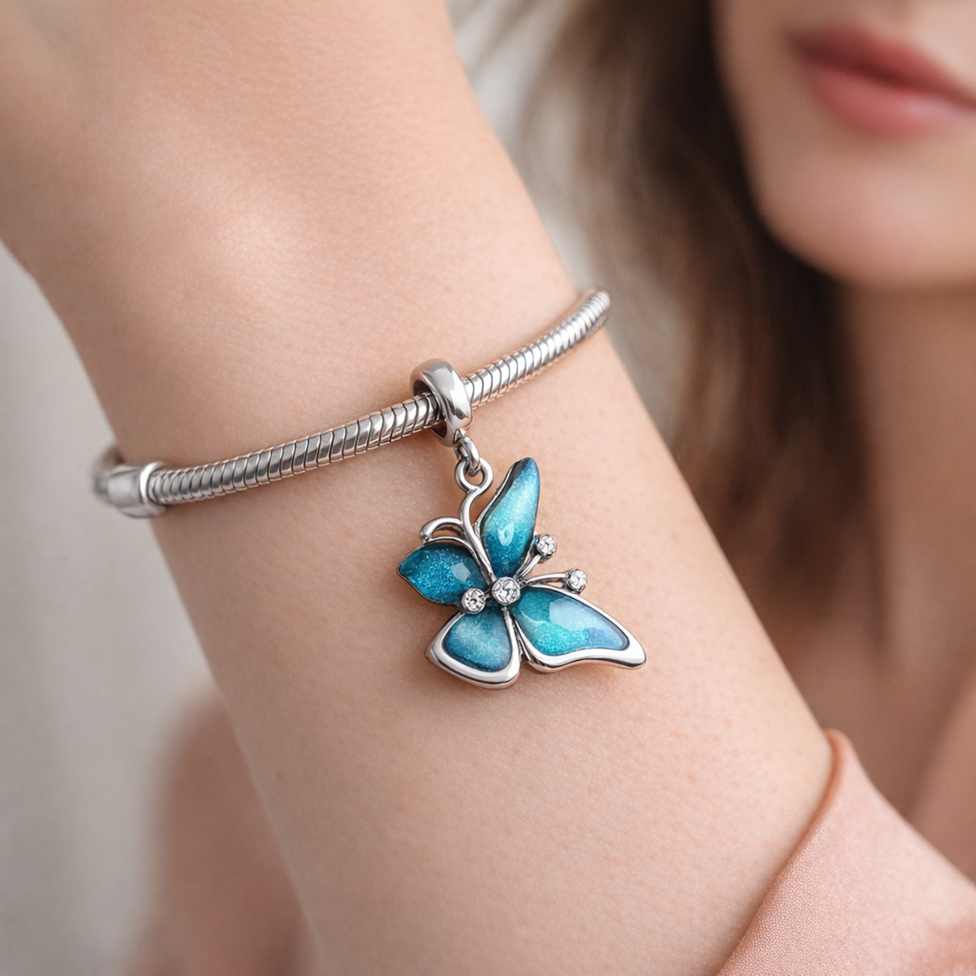 Oversized Butterfly Charm — worn on wrist