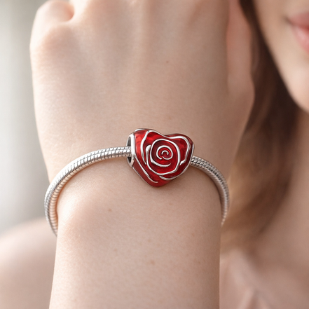 Rose Heart Charm — worn on wrist