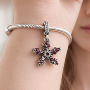 Red Crystal Snowflake Charm - Red Crystal Snowflake Charm — worn on wrist