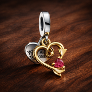 Engravable Heart & Arrow Double Dangle Charm — display on walnut