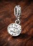 Sparkling Firework Double Dangle Charm — display on walnut
