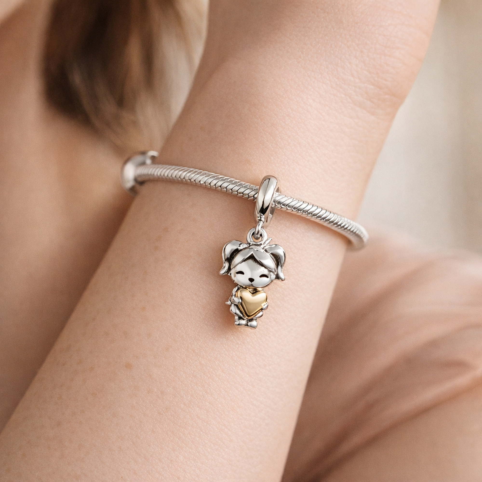 Happy Girl Dangle Charm — worn on wrist