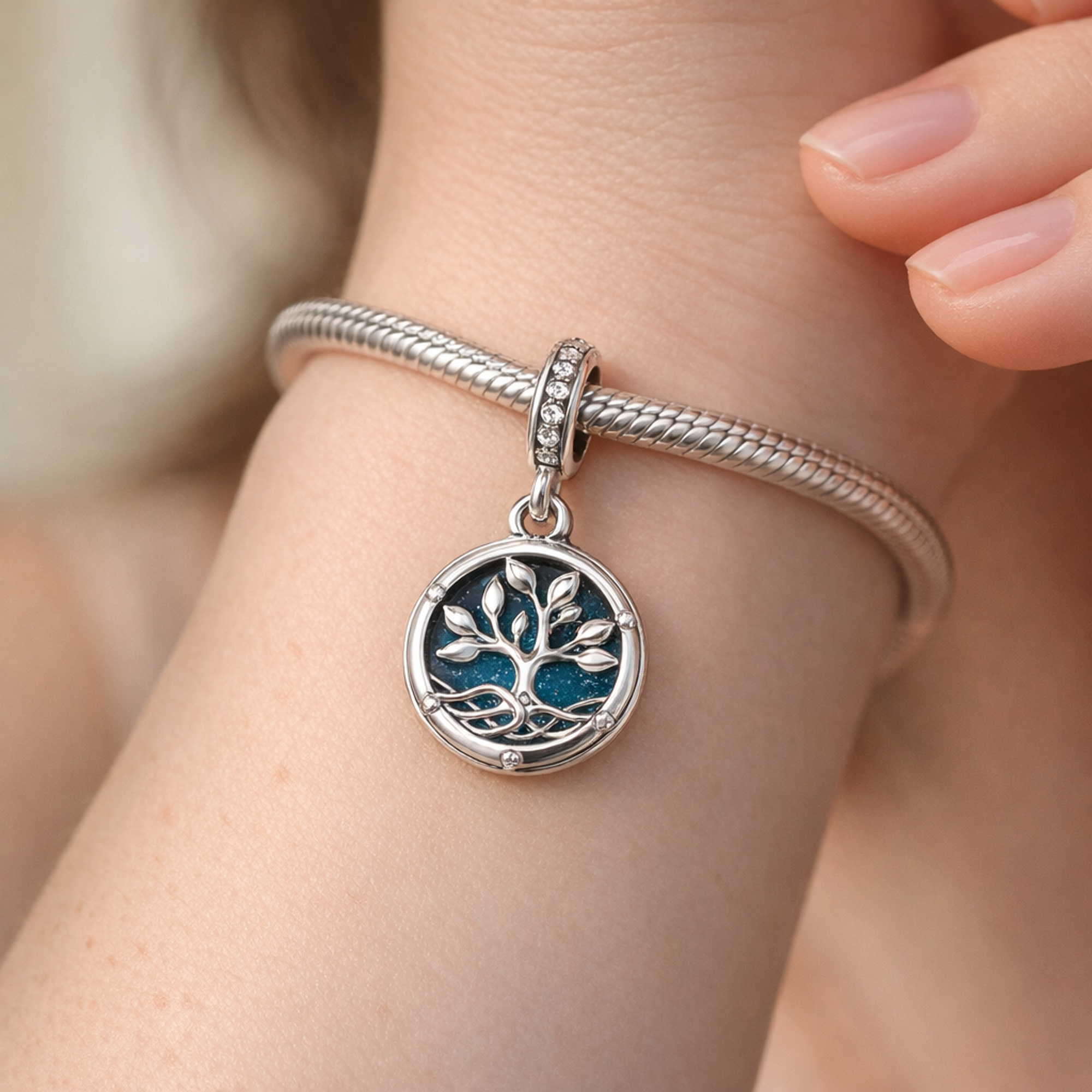 Glow-in-the-dark Infinity Tree Double Dangle Charm — worn on wrist