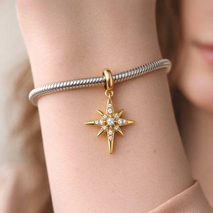 Sparkling North Star Dangle Charm — worn on wrist