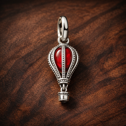 Hot Air Balloon Murano Glass Dangle Charm — display on walnut