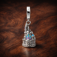 Disney Castle Charm - Disney Castle Charm — display on walnut