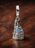 Disney Castle Charm - Disney Castle Charm — display on walnut