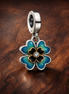 2025 Four Leaf Clover Lab-Grown Diamond Dangle Charm — display on walnut