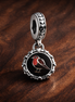 Sagittarius Zodiac Charm - Sagittarius Zodiac Charm — display on walnut