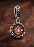 Firefighter Dangle Charm — display on walnut
