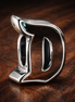 Silver Initial D Charm - Initial D Charm — display on walnut
