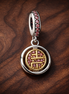 London Medallion - London Medallion Charm — display on walnut
