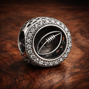 Engravable Football Charm — display on walnut