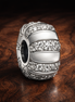 White Crystal Stripe Bead - White Crystal Stripe Bead Charm — display on walnut