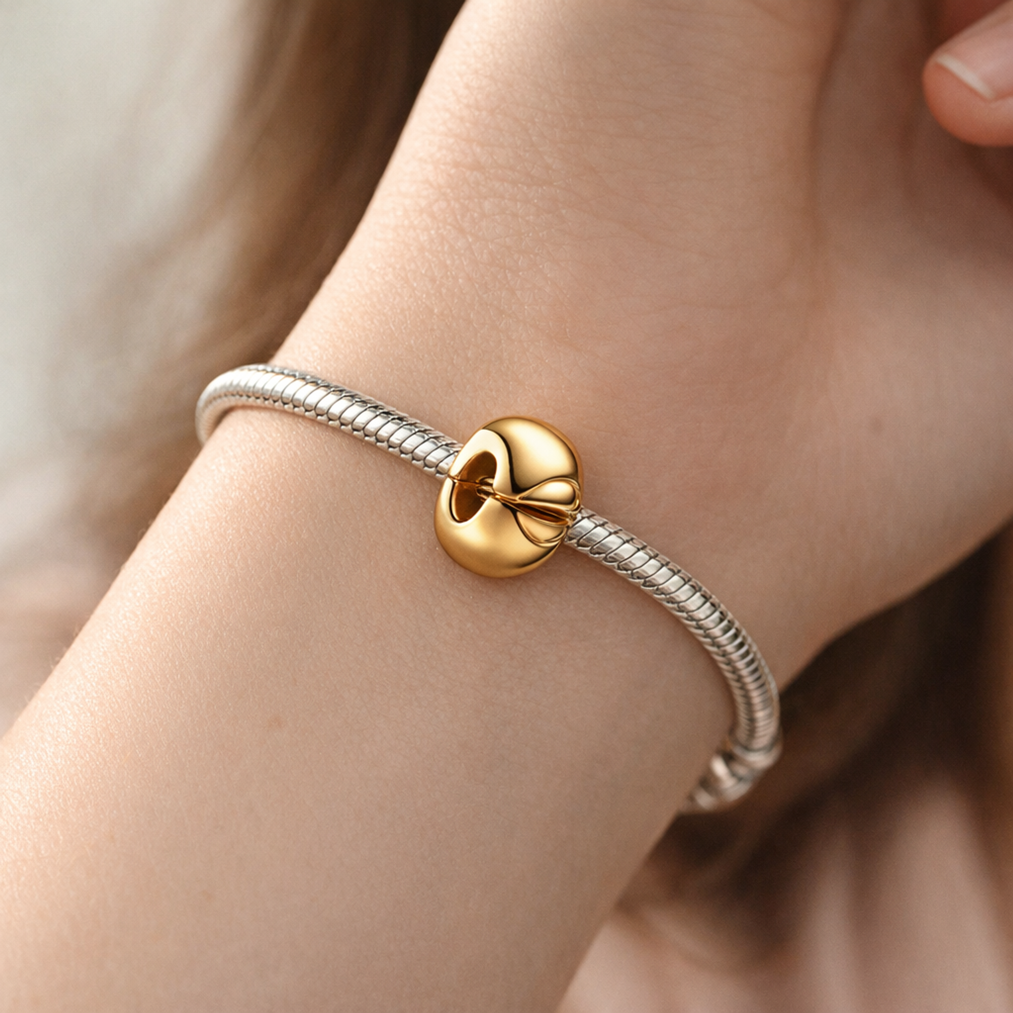 Round Clip Charm — worn on wrist