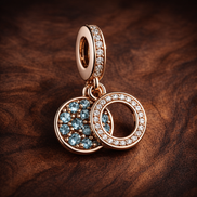 Rose Gold Plated Double Circles - Rose Gold Plated Double Circles Charm — display on walnut