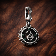 Snake Medallion Green Star - Sterling Silver Snake Medallion Dangle Charm With Green Enamel Star Accents — display on walnut