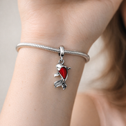 Red Murano Glass Koi Fish Mini Dangle Charm — worn on wrist