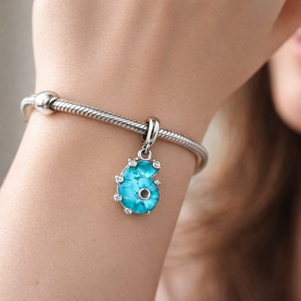 Turquoise Flower Charm - Turquoise Flower Charm — worn on wrist