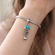 Fishbone Turquoise Charm - Fishbone Turquoise Charm — worn on wrist