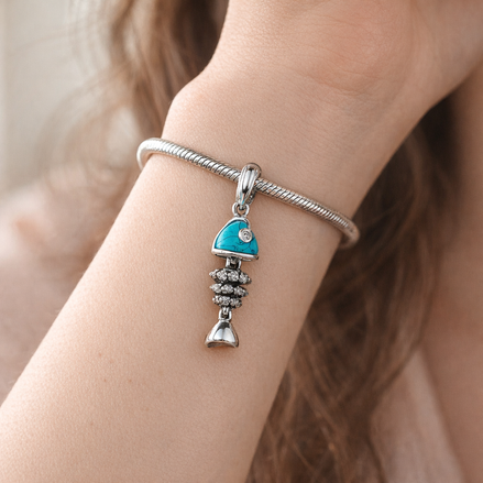 Fishbone Turquoise Charm - Fishbone Turquoise Charm — worn on wrist