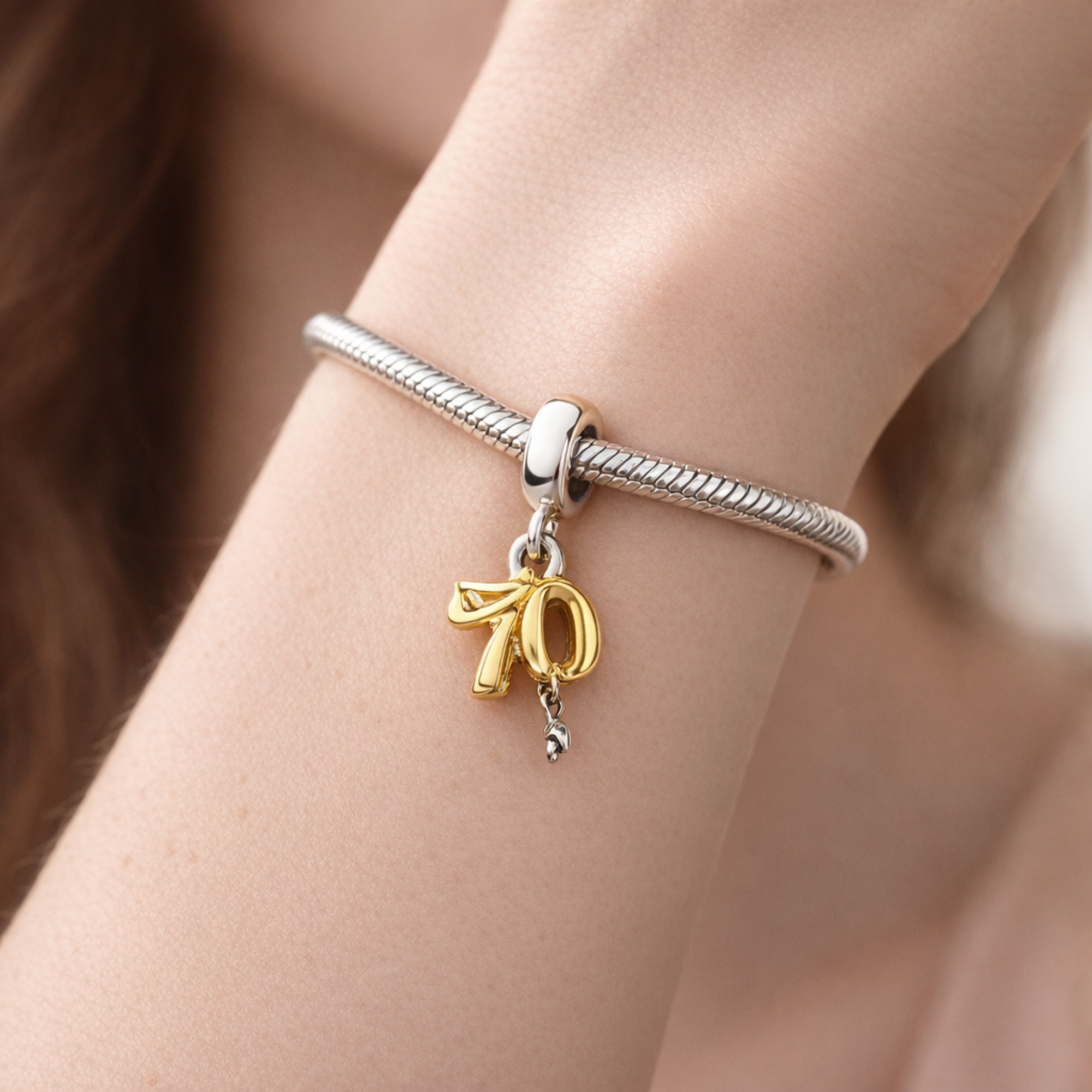 Gold Plated Ribbon Tools Charm - Gold Plated Ribbon Tools Charm — worn on wrist