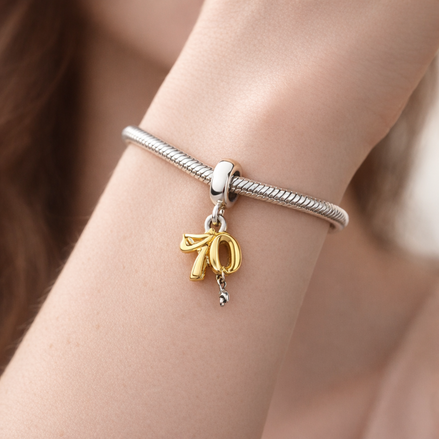 Gold Plated Ribbon Tools Charm - Gold Plated Ribbon Tools Charm — worn on wrist