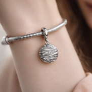 Engravable Mini Medallion Charm — worn on wrist