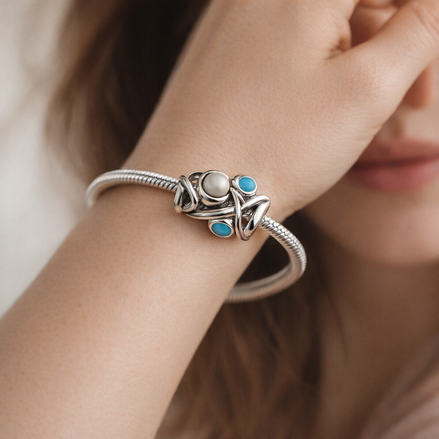 Openwork Fish Charm — worn on wrist