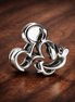 Disney Mickey Mouse Openwork Charm — display on walnut