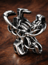 Disney Pluto Openwork Charm — display on walnut