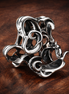 Disney Minnie Mouse Openwork Charm — display on walnut