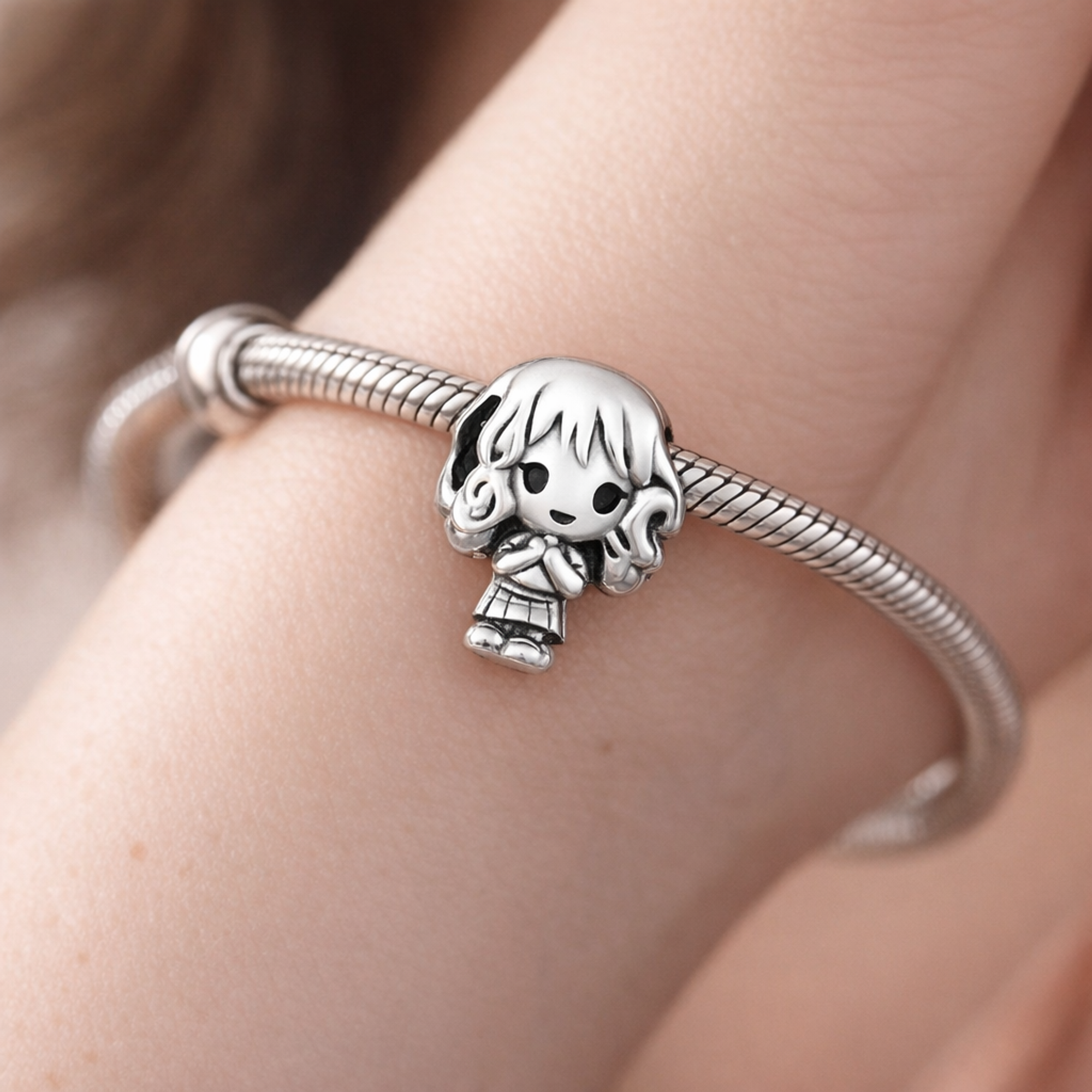 Girl Character Curly Hair And Book Detail - Sterling Silver Girl Character Charm With Curly Hair And Book Detail — worn on wrist