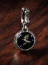 Fairy Star Medallion - Fairy Star Medallion Charm — display on walnut