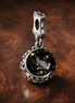 Dragon Star Medallion - Dragon Star Medallion Charm — display on walnut