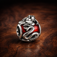 Red Crab Bead - Red Crab Bead Charm — display on walnut