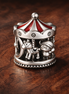 Carousel Bead - Carousel Bead Charm — display on walnut