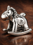 Rocking Horse Charm - Rocking Horse Charm — display on walnut