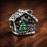 Gingerbread House Bead - Gingerbread House Bead Charm — display on walnut