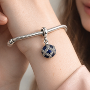 Purple Knot Medallion - Purple Knot Medallion Charm — worn on wrist