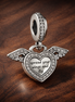 Heart and Angel Wings Dangle Charm — display on walnut