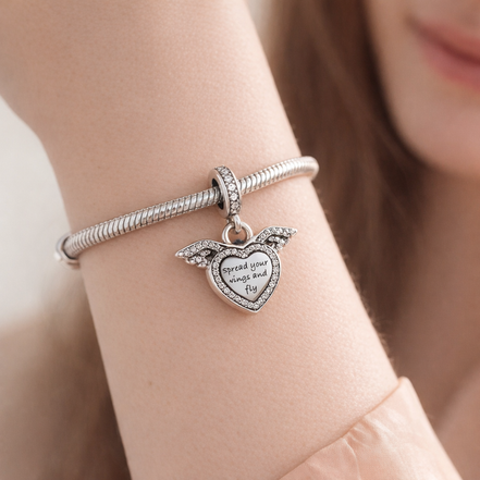 Heart and Angel Wings Dangle Charm — worn on wrist