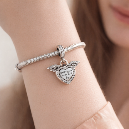 Heart and Angel Wings Dangle Charm — worn on wrist