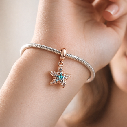 Sparkling Starfish Dangle Charm — worn on wrist