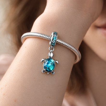 Murano Glass Sea Turtle Dangle Charm — worn on wrist