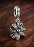 Silver Daisy Dangle - Crystal Daisy Dangle Charm — display on walnut