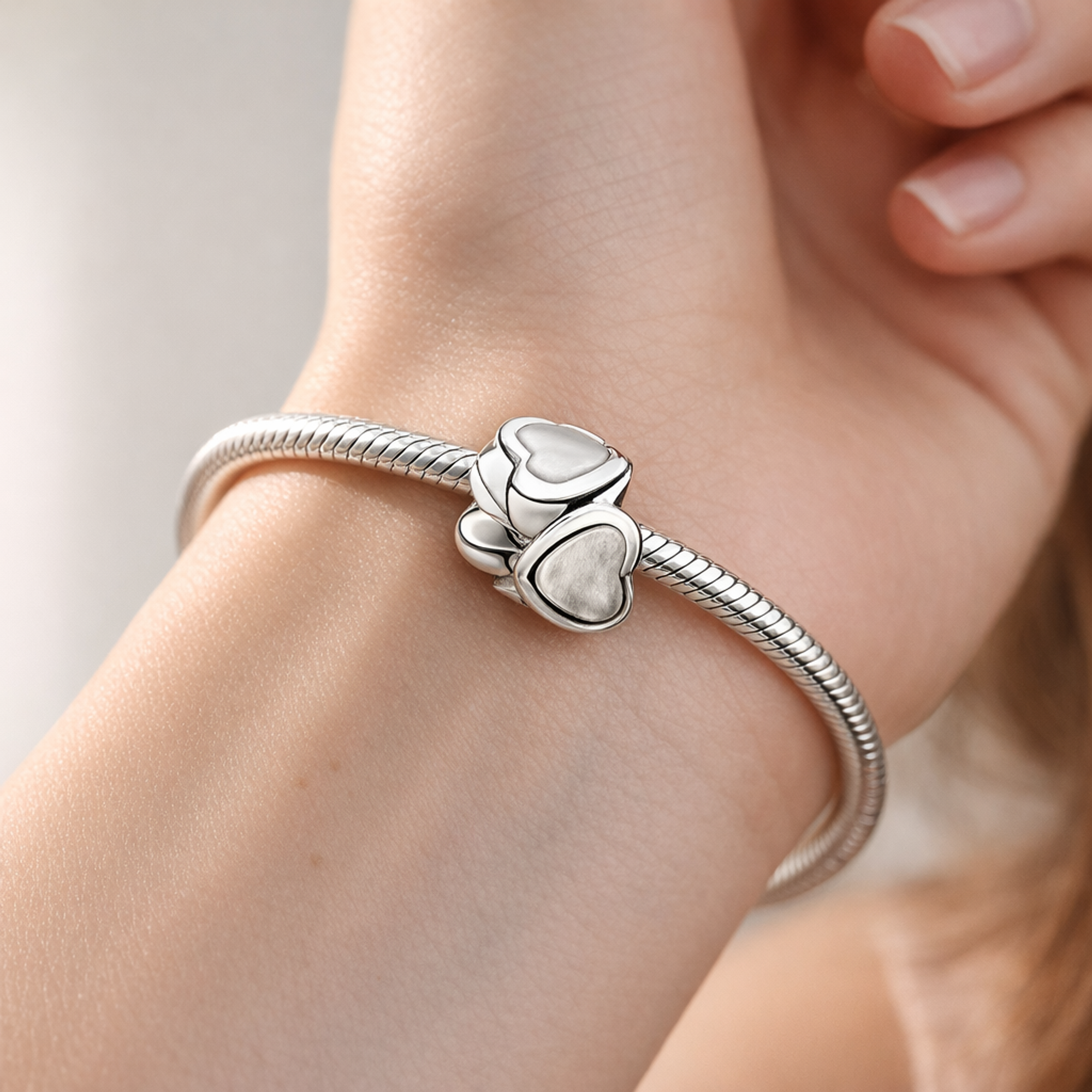 Open Heart Spacer - Sterling Silver Open Heart Spacer Charm — worn on wrist