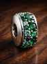 Emerald Pave Band - Emerald Green Crystal Spacer — display on walnut