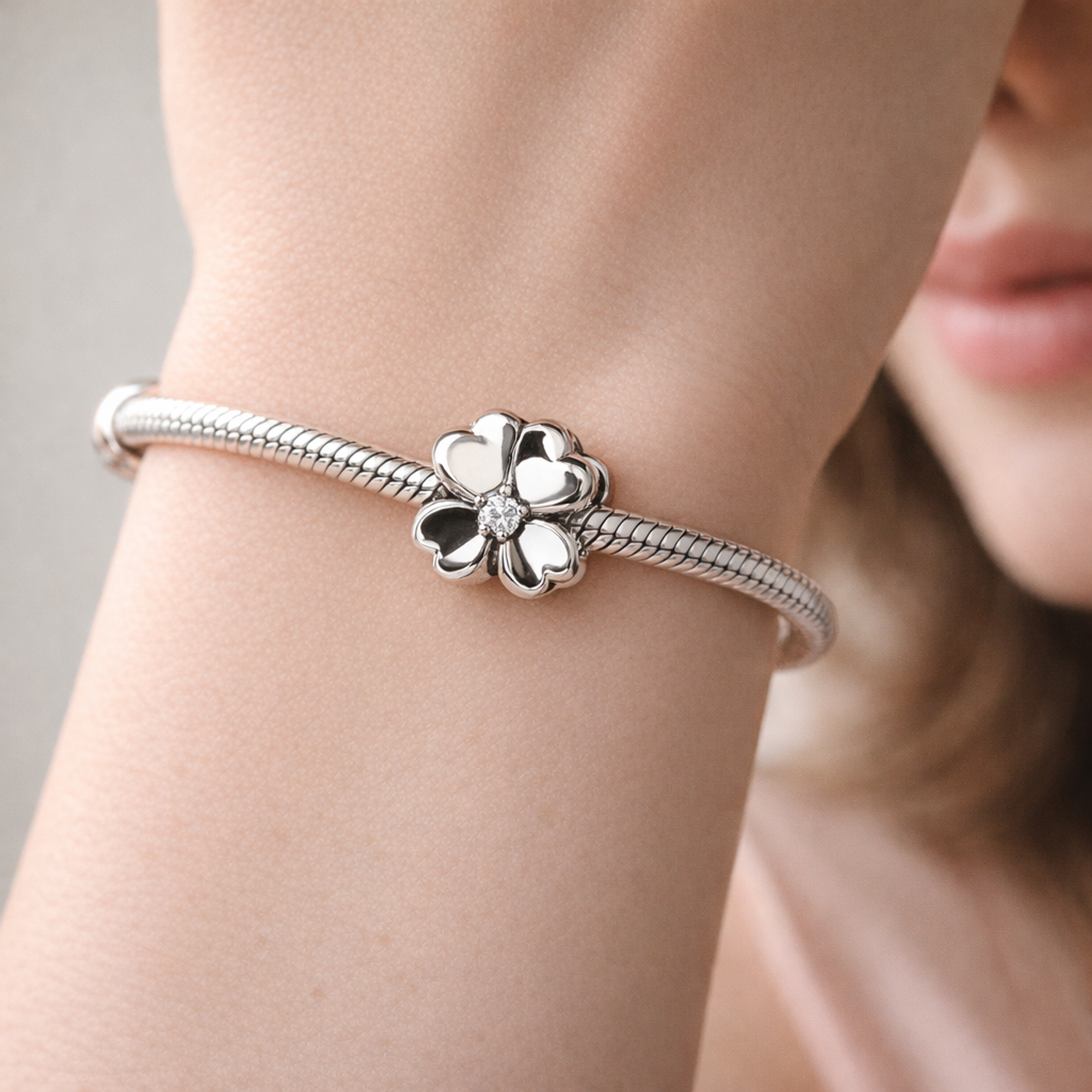 White Flower Dangle - White Petal Crystal Flower Dangle — worn on wrist
