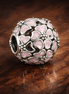 Pink Heart Openwork - Soft Pink Heart Cluster Charm — display on walnut